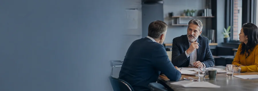 A manager reviewing leadership priorities with a colleague